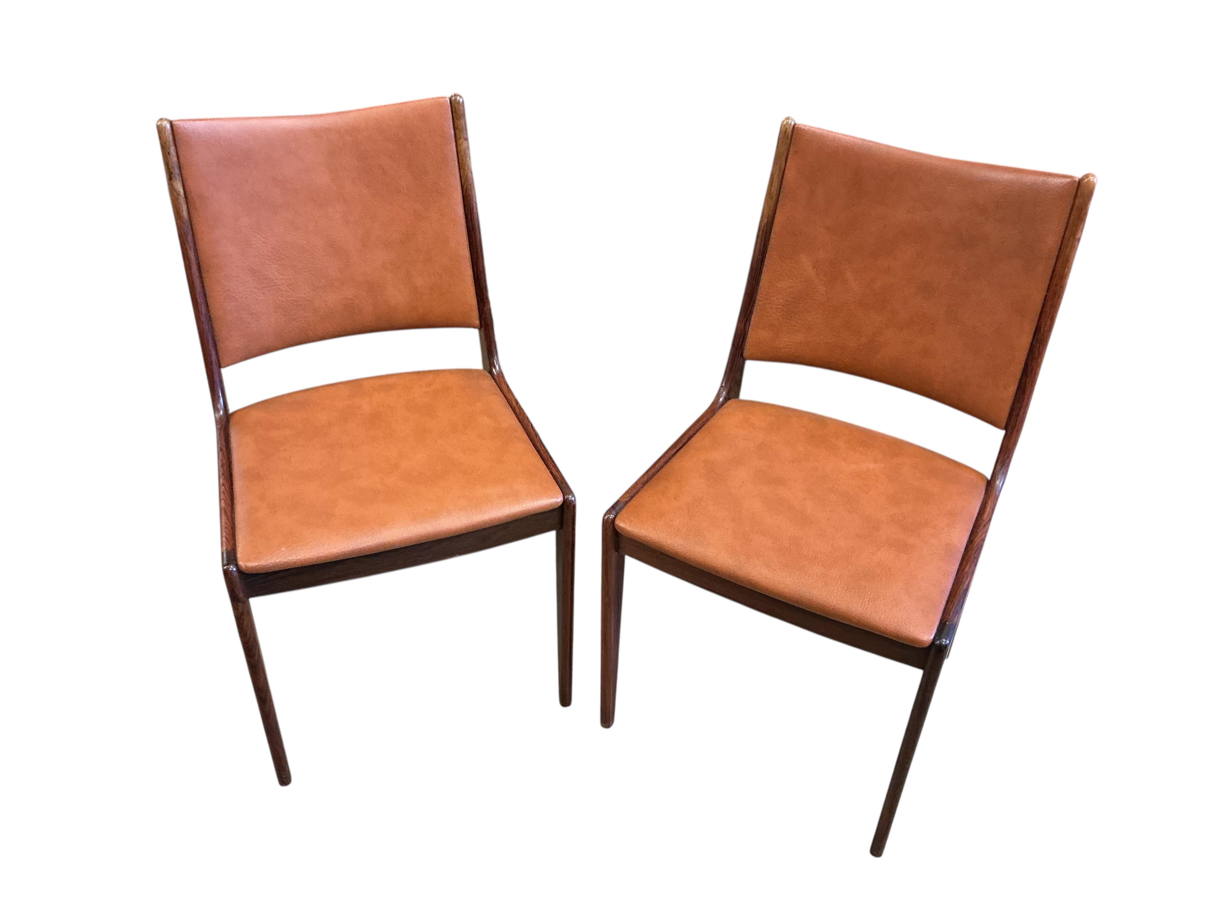 Johannes Andersen for Uldum Mobelfabrik, a set of six teak and tan leather dining chairs, width 42cm, height 84cm